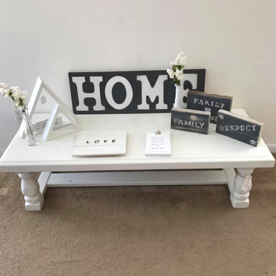 Table with different signs and triangle for sale Mc Lane Factory Store